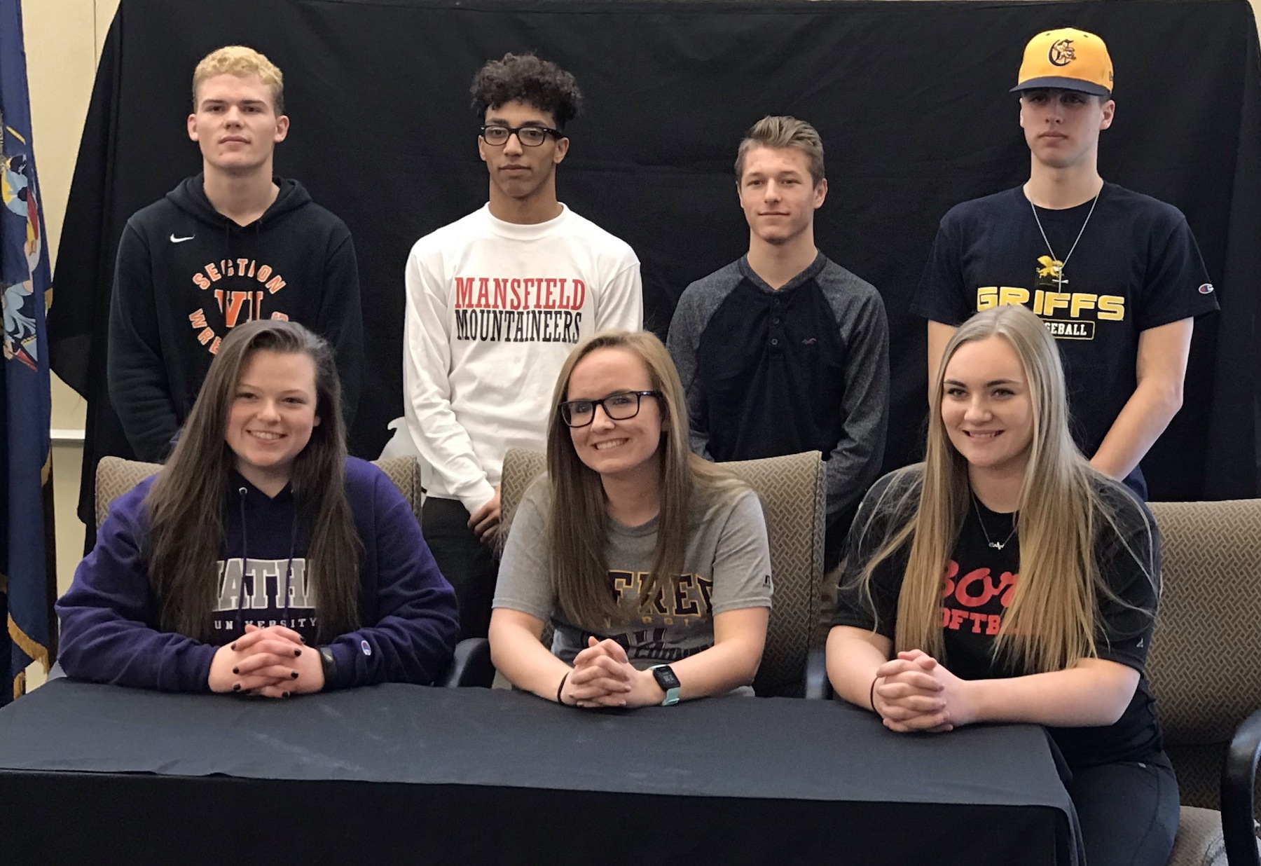 The seven seniors who sign to extend their athletic careers into college. From left, back row, Josh Thibeault, Jordan Parks, Nick Stott and Tom Peltier. Front row, Selena Justus, Mackenzie Grosskopf and Mackenzie Quider. (Photos by David Yarger)